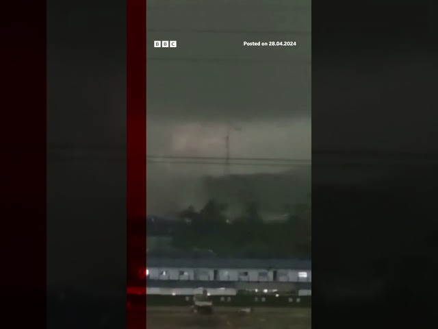 Moment tornado hits power lines in China