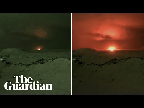 Moment Iceland volcano erupts, illuminating night sky