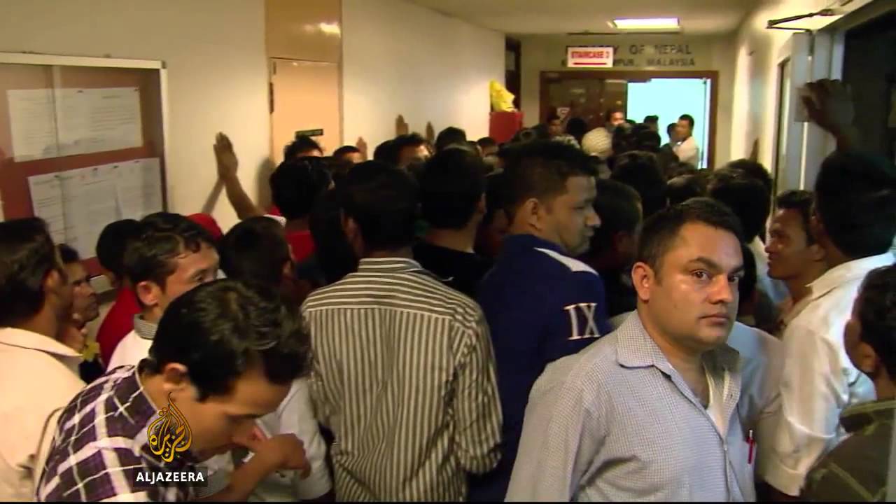 Foreign workers struggle in Malaysia - YouTube