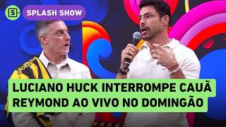 Awkward moment? Cauã Reymond gets interrupted by Luciano Huck while explaining his new series on ...