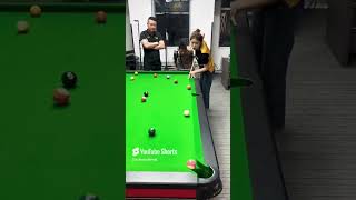 There Is A Beautiful Girl Who Plays Billiards Very Well.