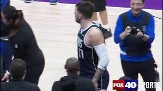 Luka waves goodbye to former Kings GM Vlade Divac seated courtside!