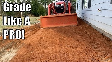 Hoe u grond egaliseert met een compacte tractor met voorlader