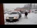 Car stuck in snow, it needs winter tires, sliding