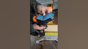 installing a sanding pad on a detail sander like and subscribe for more content