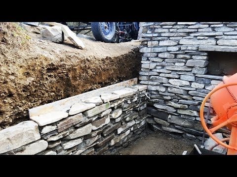 Video: Cum construiești un zid de reținere cu bolovan natural?