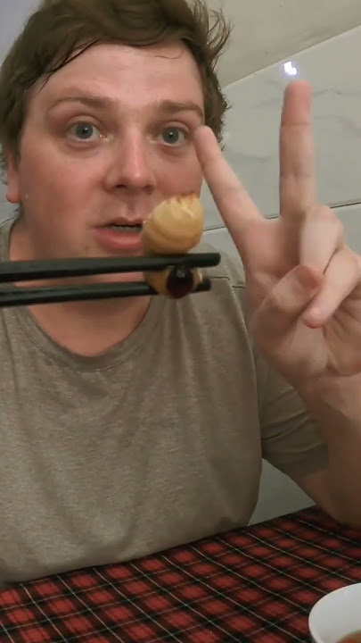 Trying Coconut Worm for the First Time in Vietnam #vietnam #coconutworm #exoticfood #saigon #shorts