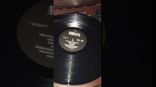 Listening To Greatest Hits by Nirvana on Vinyl