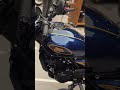 royal enfield guerrilla 450 twilight blue under showroom lights, beautiful color from RE
