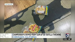 Championship stripped from team after tortilla throwing in racist incident