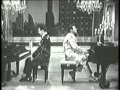 Liberace performing Night and Day and There'll Be No New Tunes On This Old Piano