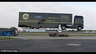 WatchF1 transporter jumps speeding Lotus F1  1