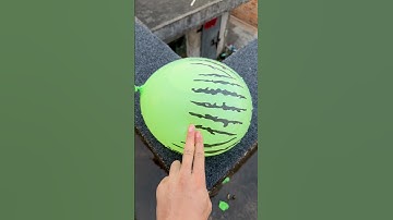Experiment: Will a water balloon explode if it rolls down a tall building? 💥🎈 #balloon