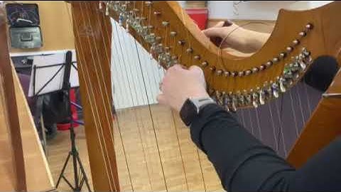 Winding on a harp string | real time tutorial | how to change a harp string