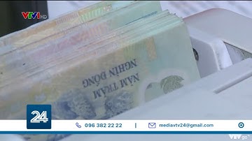 Tỷ lệ nợ xấu hệ thống ngân hàng vẫn trong tầm kiểm soát | VTV24