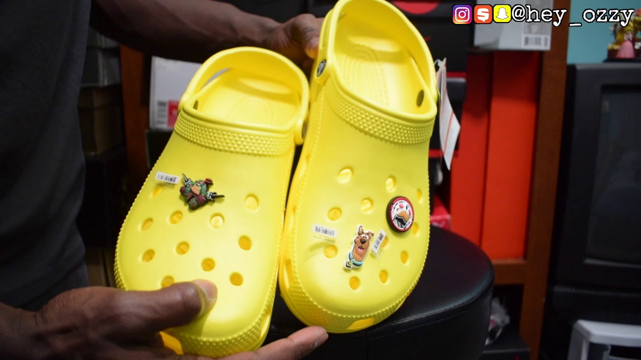 yellow crocs on feet