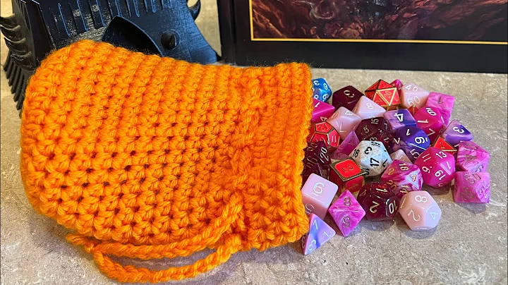 Learn How to Crochet an Orange Dice Bag!