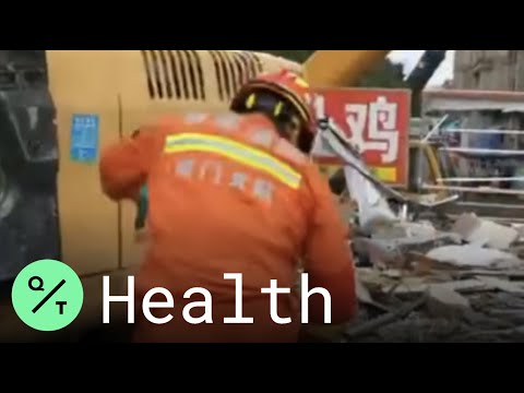 Firefighter Breaks Down After Children's Bodies Pulled From China Virus Hotel Rubble