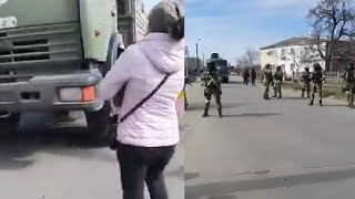 UKRAINIAN WOMAN CONFRONTS ARMED RUSSIAN SOLDIERS || TELLING THEM TO FIGHT WITH ONLY HANDS.