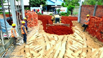 Complete Construction Road By Skill Bulldozer Pushing And 5 Ton Dump Truck Unloading Red Pebbles