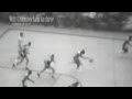 Bill russell jumps over a guy from near the ft line  insane speed and hang time