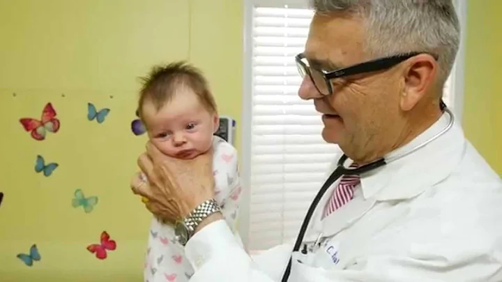 How To Calm A Crying Baby - Dr. Robert Hamilton Demonstrates "The Hold" (Official) - DayDayNews