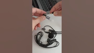 Unplug the adapter from the audio splitter and prepare to separate the clip-on microphone #shorts