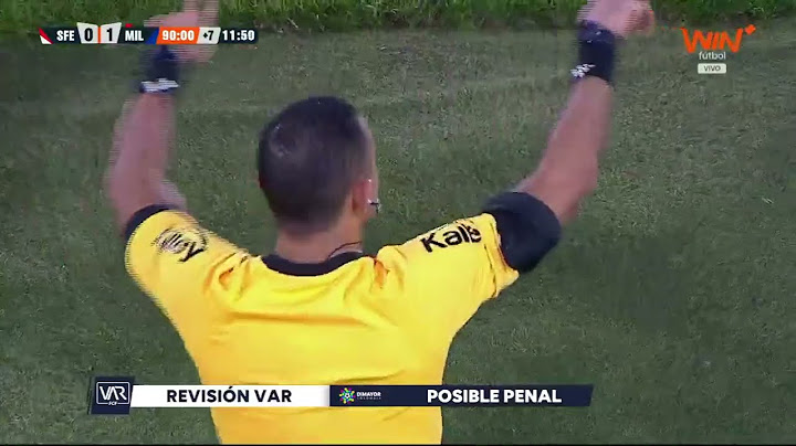 After the VAR review, the referee ruled that it was not a penalty in favor of Santa Fe against Mi...