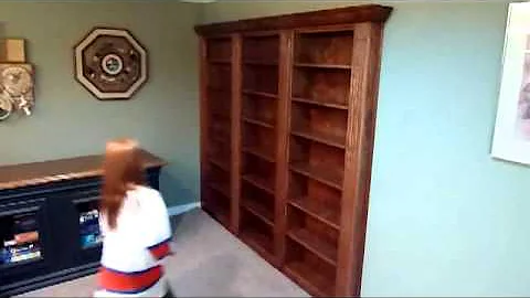 Hidden bookcase door to secret room