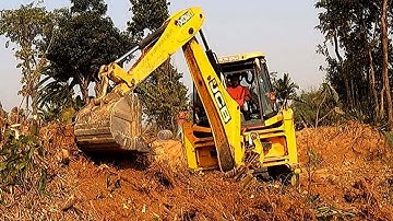 Backhoe Loader Uprooting Bamboo Root & Throwing It Out