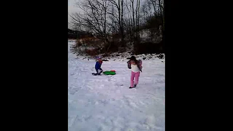 Alisha & Alivea wipe out sled rideing