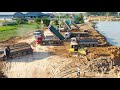 Dump Trucks and Bulldozer best working - Dump trucks unloading soil and Bulldozer pushing soil