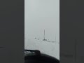 mitsubishi Shogun 3.2 driving up a mountain in snow