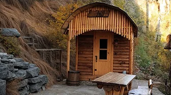 Warm House of Wood for Survival. Stove of Stone