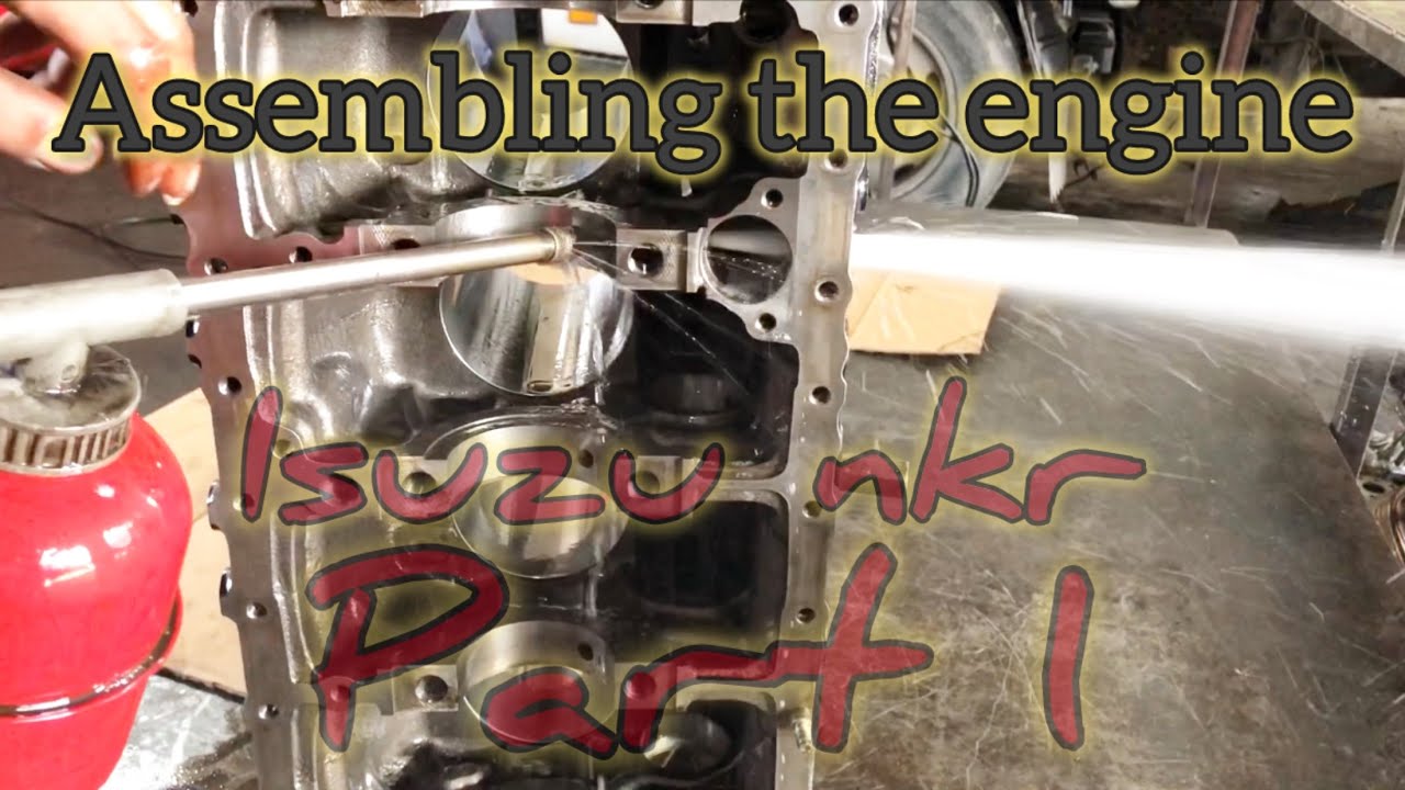 Asembling the engine nkr isuzu - YouTube