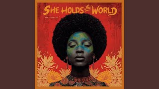 She Holds The World