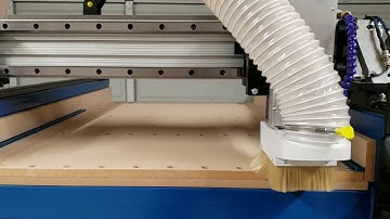 CNC router equipped with Centroid Acorn controller, spoil board surface with Vcarve Pro