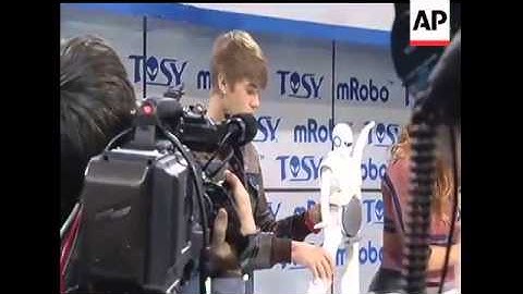 Pop singer Justin Bieber unveiled a state-of-the-art speaker that doubles as a dancing robot at the