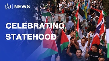 Palestinians celebrate recognition of statehood in the West Bank