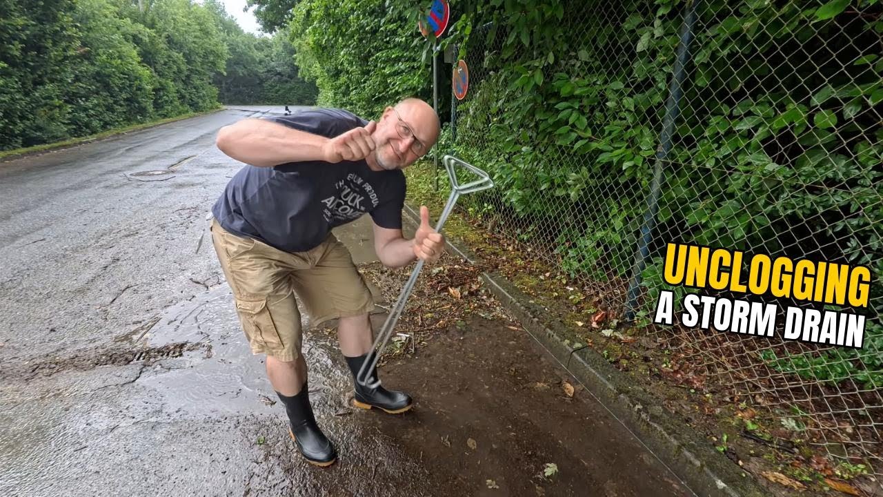 #072-1 Unclogging a storm drain on a road after rain in Germany - YouTube