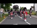 Massed Pipes & Drums parade through Deeside town to start the Ballater Highland Games 2018