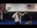 Basic Self Defense Tutorial: The Ole "Up and Over" Lapel Grab
