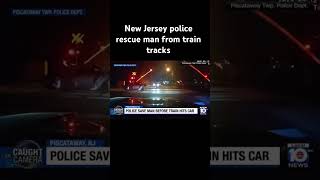 New Jersey police rescue man from train tracks #newjersey #rescue