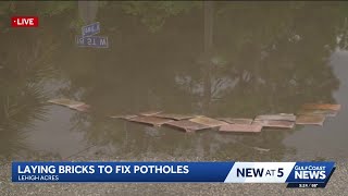 Lehigh Acres resident fills pothole in road with bricks