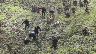 Cheese chasers launch downhill in annual British race | AFP