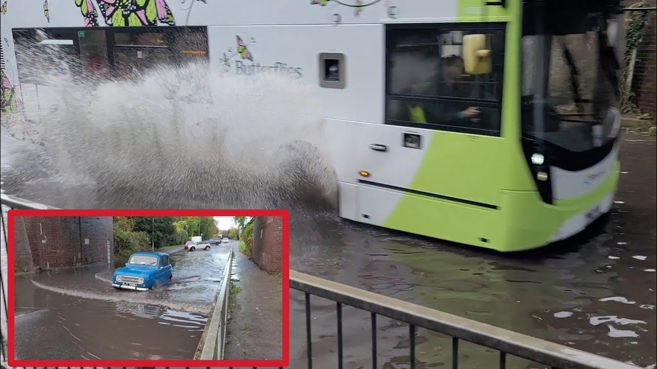 cars vs flood including a Double decker bus flooring it through creating a huge wave!