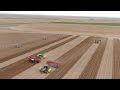 Planting idaho potatoes with four 8row spudnik planters    brett jensen farms 2023