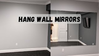 Mounting mirrors on the wall of my home gym