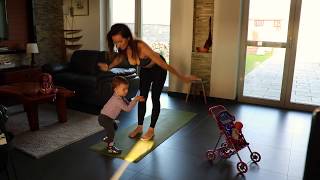 Morning yoga with little girl by Yogatina