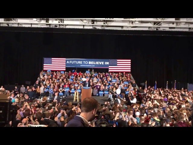 Bernie comes on stage after S Carolina crush to 'Keep on rockin' in the free world' by Neil Young class=